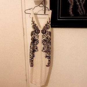 Long black ans white Bebe dress .